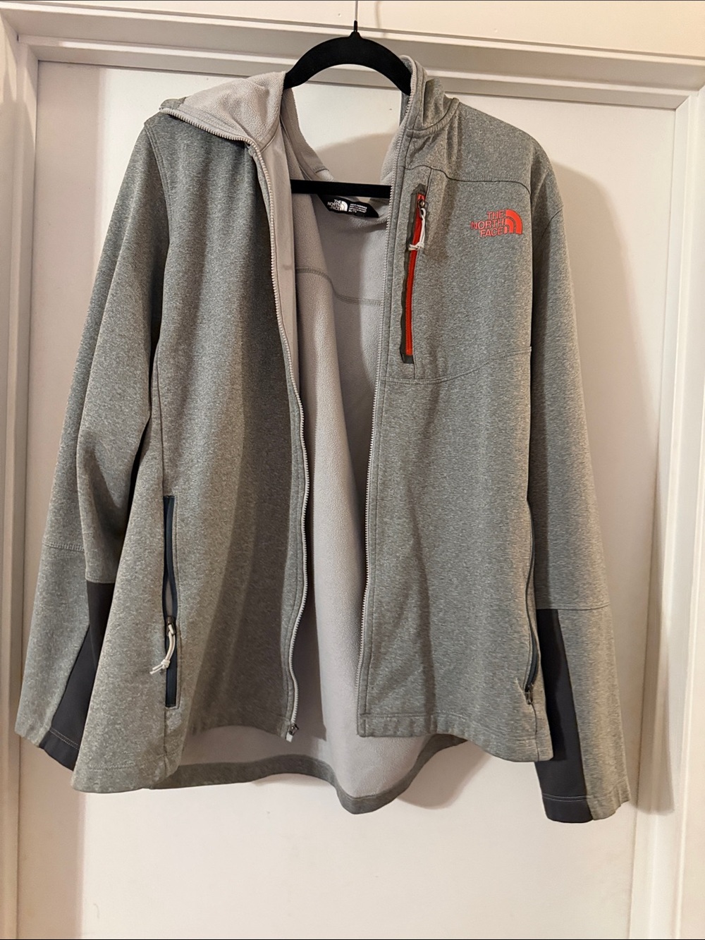 The North Face Light Gray Full-Zip Jacket with Orange Logo Accent